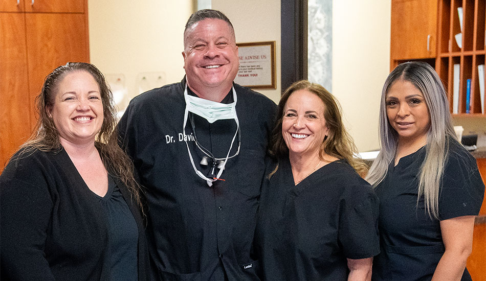 Dr. Raiffe with his dental team in Phoenix, AZ
